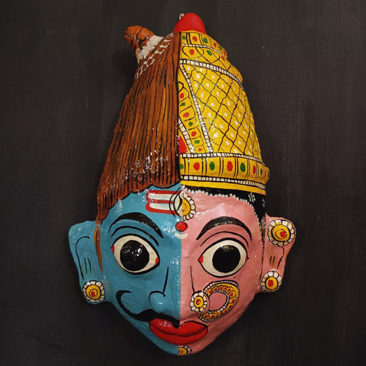 ardhanareshwara cheriyal mask in blue and pink color combination represents lord shiva and parvati devi