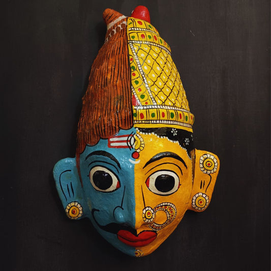 ardhanareshwara cheriyal mask in blue and yellow color combination represents lord shiva and parvati devi