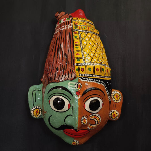 ardhanareshwara cheriyal mask in blue and brown color combination represents lord shiva and parvati devi