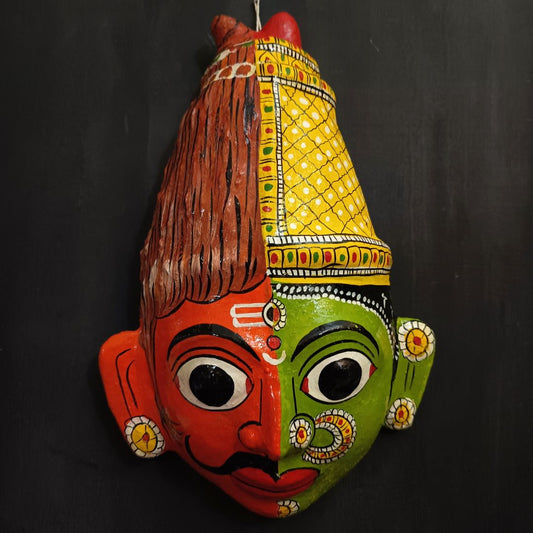 ardhanareshwara cheriyal mask in red and green color combination represents lord shiva and parvati devi