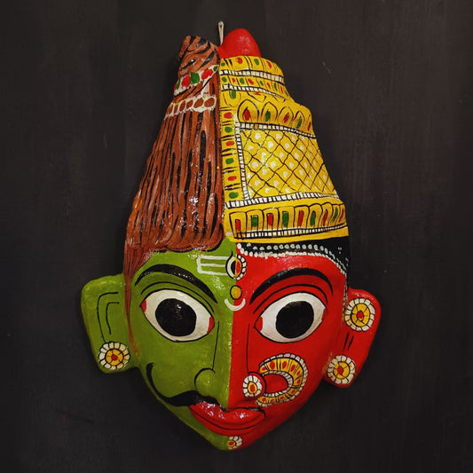 ardhanareshwara cheriyal mask in green and red color combination represents lord shiva and parvati devi