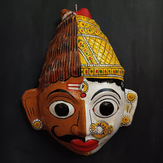 ardhanareshwara cheriyal mask in brown and white color combination represents lord shiva and parvati devi
