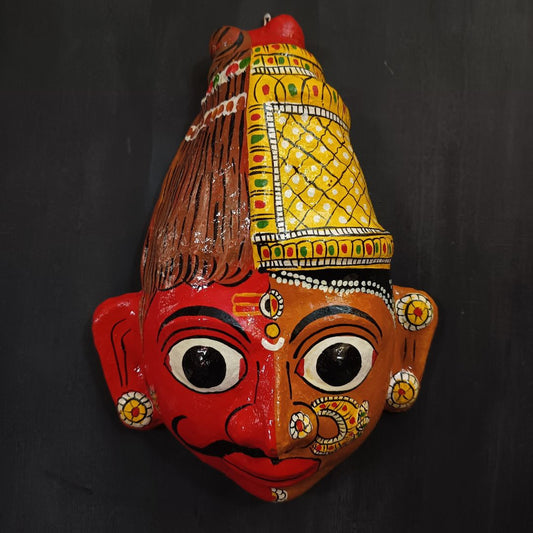 ardhanareshwara cheriyal mask in red and brown color combination represents lord shiva and parvati devi