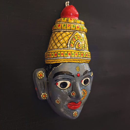 crowned female cheriyal mask in deep indigo color face with traditional and vintage look
