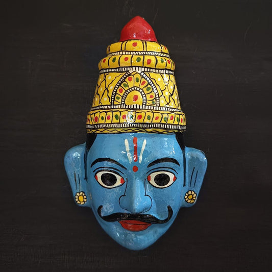 crowned blue color male cheriyal mask in traditional look