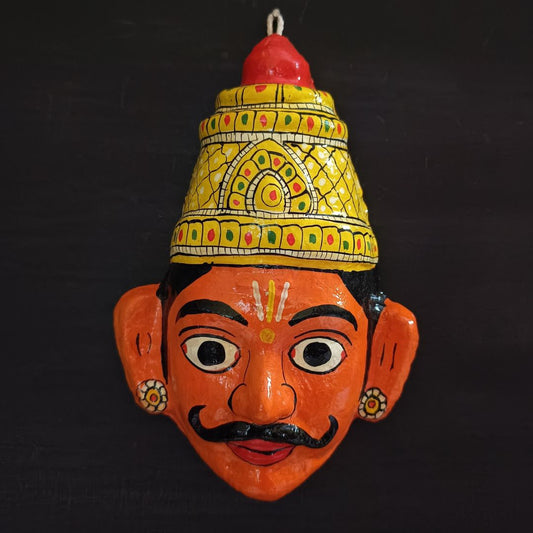crowned orange color male cheriyal mask in traditional look