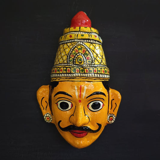 crowned male cheriyal mask in yellow color face with traditional and vintage look