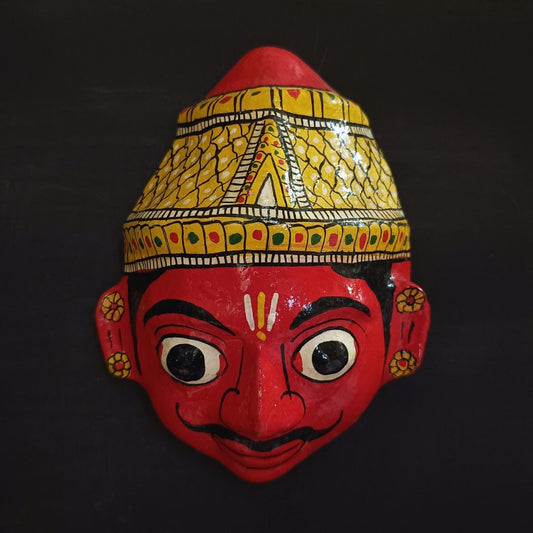 crowned male small cheriyal mask with red face and pop up eyes