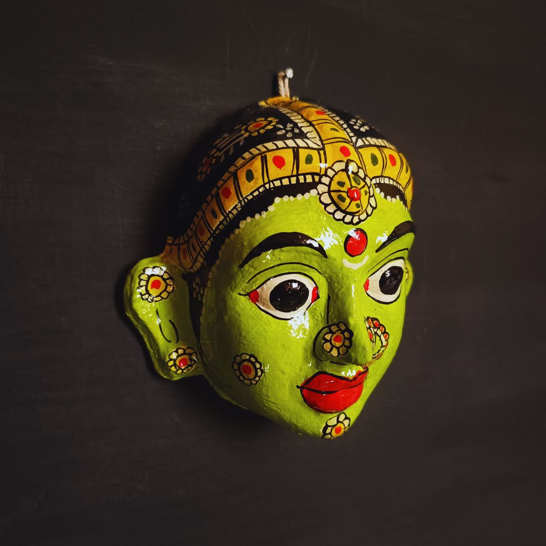 classic female cheriyal mask with light green color face wearing ornaments