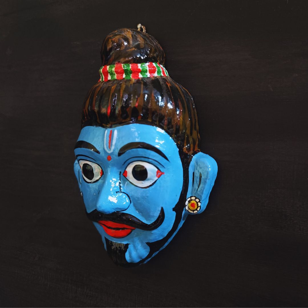 cheriyal mask of lord ram while in vanvas smiling and made in blue color