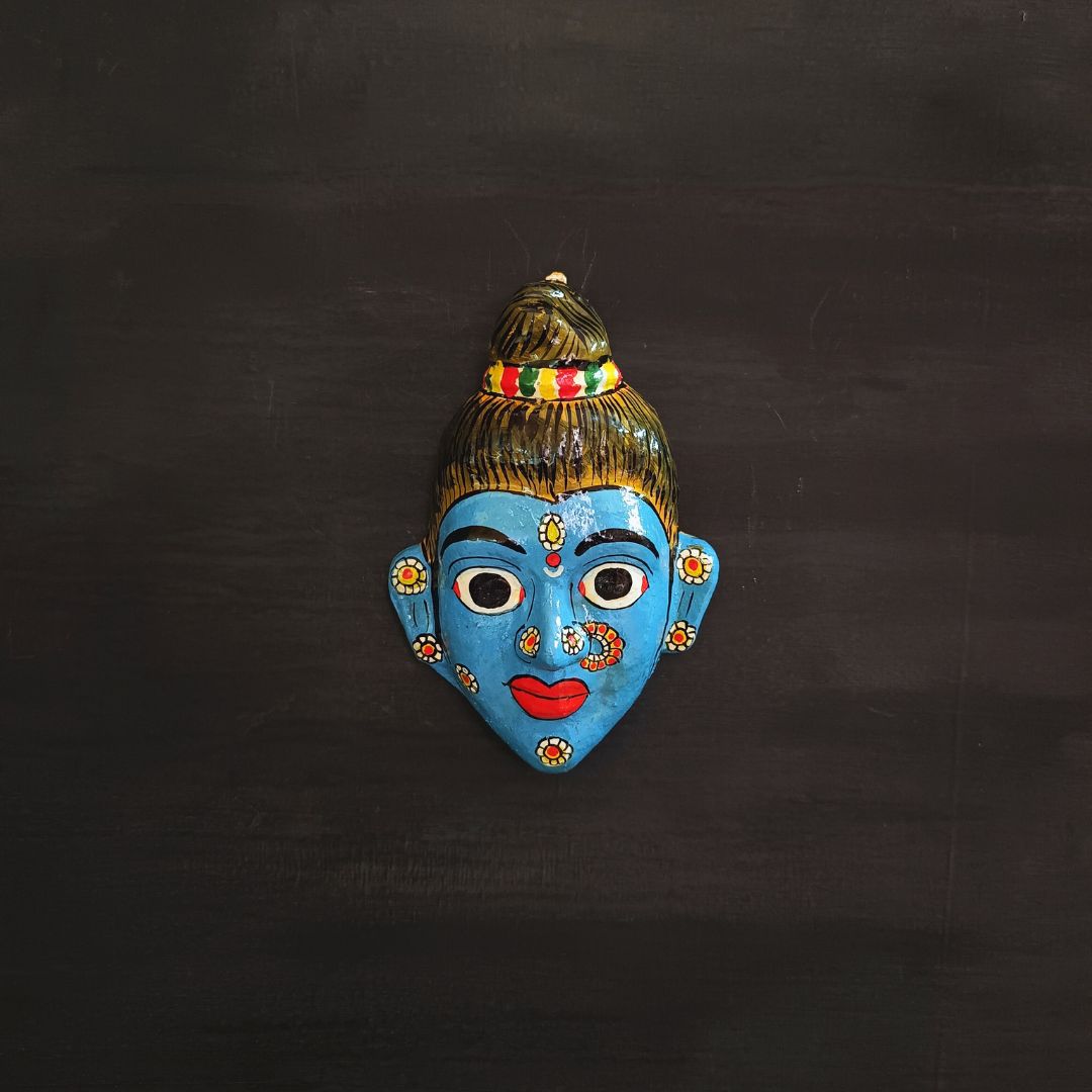 cheriyal mask of sita devi while in vanvas smiling and made in blue color
