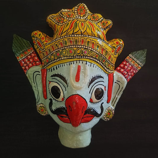 crowned garuda cheriyal mask in light blue color face with traditional and vintage look