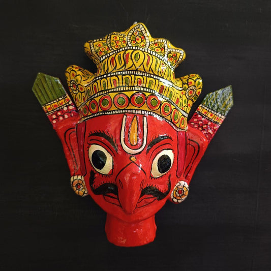 crowned garuda cheriyal mask in red color with traditional and vintage look