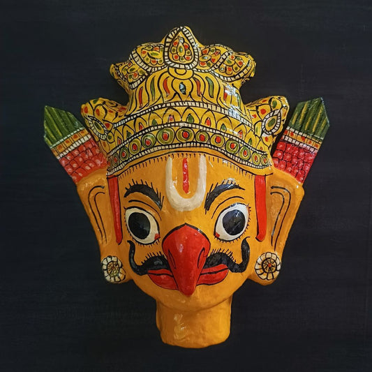 crowned garuda cheriyal mask in yellow color face with traditional and vintage look