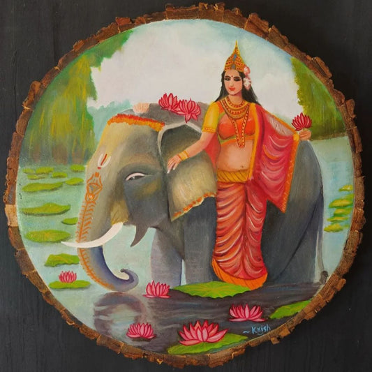 lakshmi devi in a lotus pond with her elephant