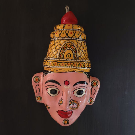 crowned female cheriyal mask in light pink face color with traditional and vintage look for home decor