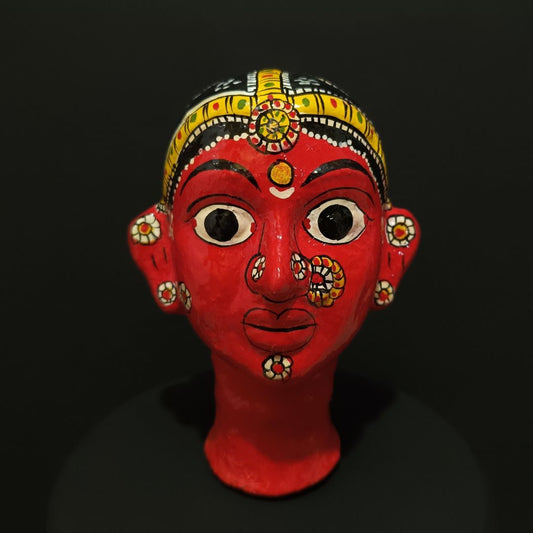 red color female cheriyal stand mask for table decor