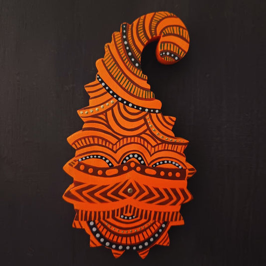 hand crafted theyyam art essence on wooden paisley that brings quirky look on wall