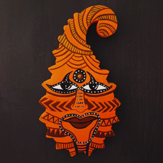 theyyam art essence on wooden paisley that brings quirky look on wall