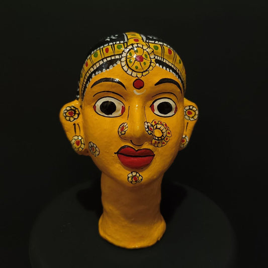 yellow color female cheriyal stand mask for table decor