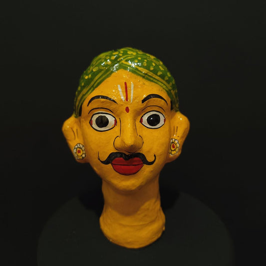 yellow color male cheriyal stand mask for table decor